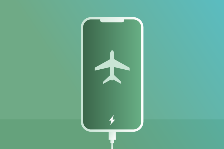 Image of a smartphone with an airplane icon on the screen, under which is a smaller charging icon.