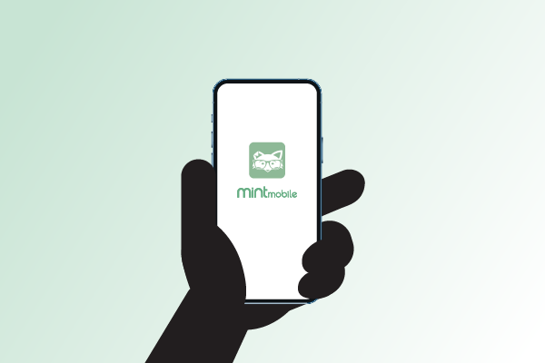 Image of Mint Fox's hand holding a smartphone with the Mint Mobile app on the screen