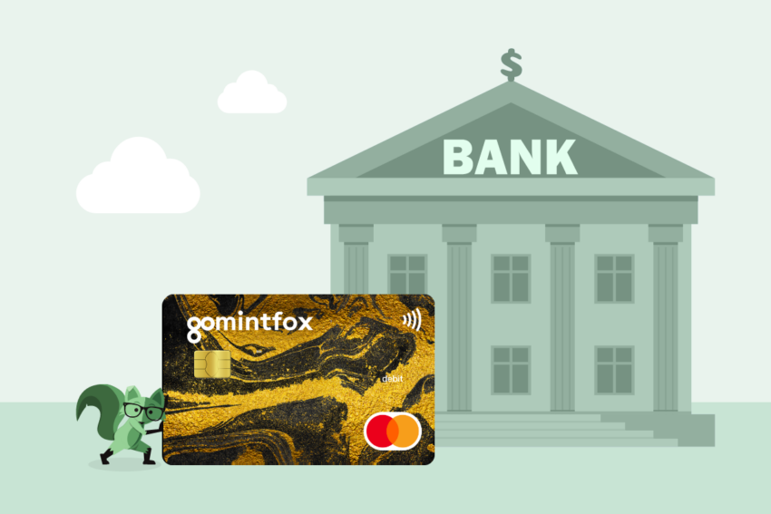 Image of a small Mint Fox pushing a large GoHenry credit card toward a bank building.